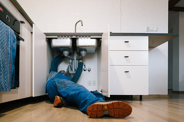 Professional Emergency Plumber technician working in Fayette, OH
